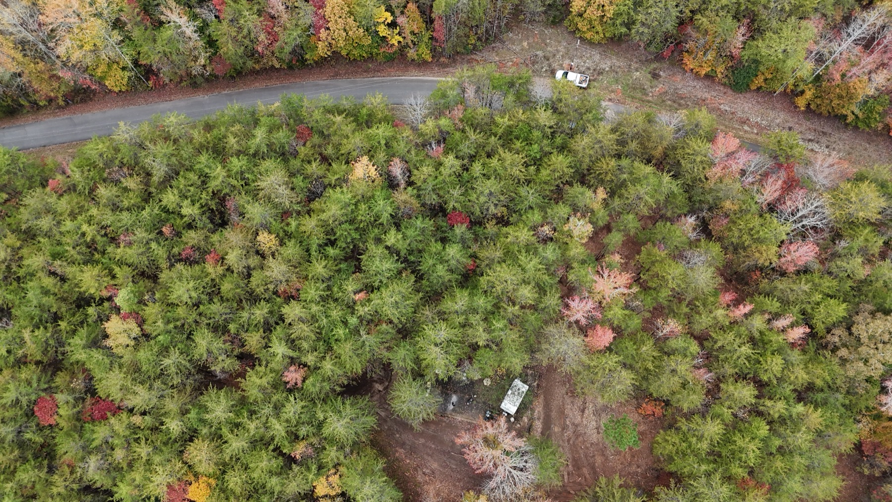 Aerial view of the farm campground and surrounding pasture